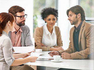 Image showing Meeting, collaboration and business people with documents in office for planning or strategy together. Teamwork, research or development with man and woman employee group in workplace boardroom