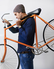 Image showing Man, studio and bicycle for sustainability, health and transportation on white background. Hipster cyclist, carbon neutral or eco friendly travel for environmental commute and fitness or exercise