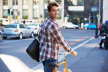 Image showing Portrait, happy man and travel on bicycle in city on eco friendly transport outdoor, commute and walking. Cycling, person and bike in urban town, road and street for journey on sidewalk in Canada