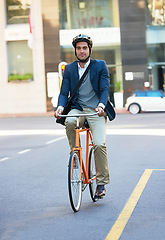 Image showing Morning, bicycle and city with road and businessman with commute for green and sustainable transport. Cyclist, smile and bike for carbon footprint in New York by urban street with cycling to job