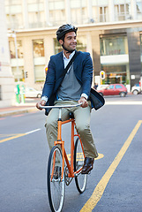 Image showing Morning, commute and city road of businessman with bicycle for green and sustainable transportation. Cyclist, smile and bike for carbon footprint in New York by urban street with entrepreneur cycling