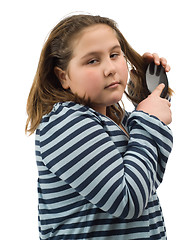 Image showing Child Brushing Her Hair