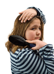 Image showing Girl Brushing Her Hair