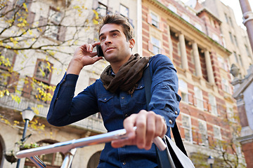 Image showing Phone call, bicycle and travel with man, city and commute with connection and adventure with eco friendly living. Person, cyclist and guy with a bike and smartphone with urban town and sustainability