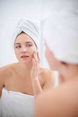 Image showing Women, selfcare and mirror for skincare, spa day routine and bathroom getting ready for organic wellness. Female person, towel and hand on face, reflection and treatment for shower and cleanliness