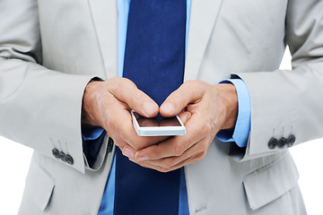 Image showing Hands, phone and businessperson in studio for networking, communication and typing a message. Closeup, professional and internet or voip for online conversation, email and app on white background