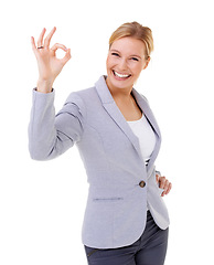 Image showing Businesswoman, studio and portrait with ok gesture, emoji and smile with hand or confidence and suit. Woman, employee and white background for excited, promotion and attitude for contact and wow