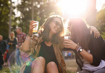 Image showing Beer, laughing and woman friends in nature together with audience or crowd at event, festival or party. Smile, funny and young people having fun in forest woods for social gathering and celebration