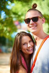 Image showing Portrait, happy and couple at music festival outdoor, event and celebration on valentines day together in summer. Face, woman and smile of man in sunglasses, party and carnival for love in nature