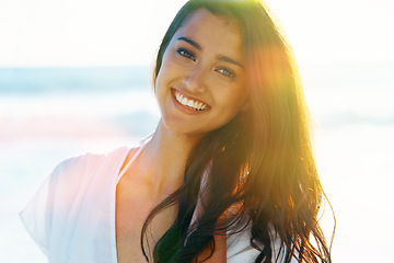 Image showing Indian woman, beach and smile for ocean, waves and breeze for summertime in Bali for vacation. Female, sea and holiday relaxation abroad in swimsuit, sand and happy for portrait, memories and trip.