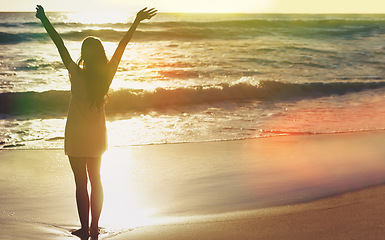 Image showing Sunset, beach and woman with freedom, space and water on excited for summer holiday in Cancun. Relax, sun and girl on ocean vacation with adventure, travel and flare on tropical island with mockup.