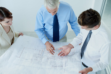 Image showing Blueprint, above or civil engineering team planning project, maintenance or renovation in meeting. Architecture, people building or group of designers with floor plan ideas for property development
