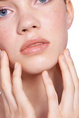 Image showing Closeup, skincare and woman in studio with face, hands and white background with natural for beauty, glow and healthy skin. Confident, self care and treatment for smooth, pure and perfect texture