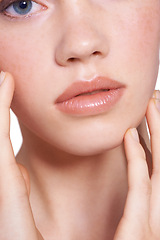 Image showing Woman, closeup and skincare with hands in white background, studio and cosmetic for healthy and confidence and smooth skin. Face, cleansing and hygiene with treatment for natural beauty and selfcare