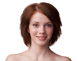 Image showing Closeup, woman and smile with natural makeup in white background, studio and confidence in perfect skin. Face, cosmetic and glow with red hair in beautiful skin with routine, aesthetic and care.