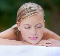 Image showing Woman, spa and sleeping after massage, facial or hotel beauty treatment with rest. Relax, calm and nap from cosmetics, care and hospitality from skincare and wellness zen with peace at a resort