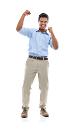 Image showing Success, fist and business man in studio for celebration, achievement or winning with bonus or happy sales. Excited employee or winner with yes for news, goals or opportunity on a white background