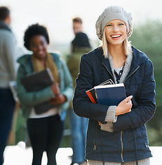 Image showing Student, woman and smile with books on campus, education and learning material for studying. Happy, scholarship and university for academic growth, textbook or notebook with knowledge in portrait