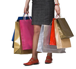 Image showing Shopping bags and legs