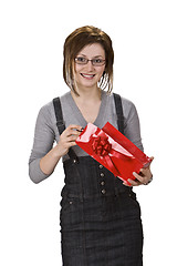 Image showing Young woman with a red gift