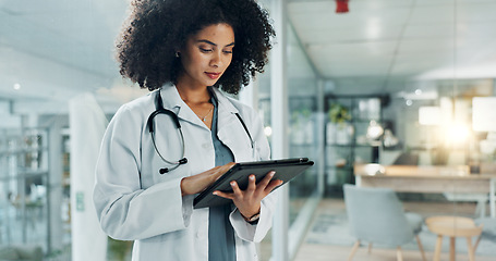 Image showing Tablet, doctor and hospital woman reading medicine study, cardiology report and check healthcare data, insight or statistics. Scroll, analysis and medical surgeon, nurse and clinic worker search web