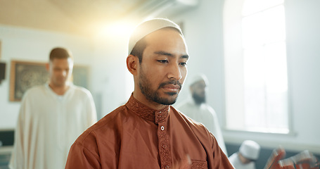 Image showing Muslim, praying and man in a Mosque for spiritual religion together as a group to worship Allah in Ramadan. Islamic, Arabic and holy people with peace or respect for gratitude, trust and hope