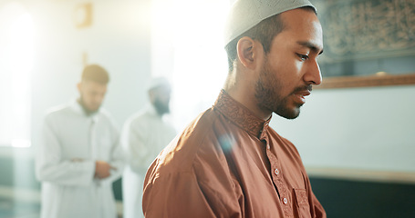 Image showing Muslim, praying and man in a Mosque for spiritual religion together as a group to worship Allah in Ramadan. Islamic, Arabic and holy people with peace or respect for gratitude, trust and hope