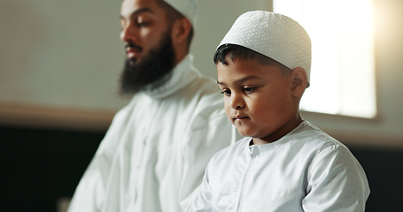 Image showing Muslim, praying and man with child in mosque for learning, religious education and worship or prayer. Islamic community, religion and person and kid for Ramadan Kareem, Eid Mubarak and teaching Quran