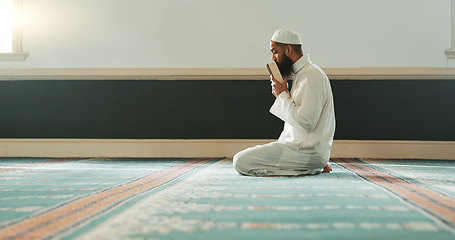 Image showing Quran, islamic and man reading for faith in a mosque for praying, peace and spiritual care in holy religion for Allah. Respect, Ramadan and Muslim person with kindness, hope and humble after worship