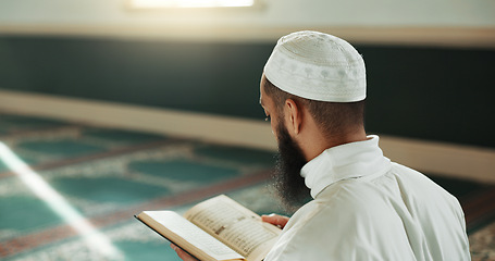 Image showing Islamic man, kiss quran and mosque for faith, reading or mindfulness with worship, praise or back for study. Muslim person, religion and peace in book, prayer or thinking with meditation in Palestine