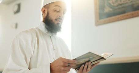 Image showing Quran, Muslim and man reading for faith in a mosque for praying, peace and spiritual care in holy religion for Allah. Respect, Ramadan and Islamic person with kindness, hope and humble after worship