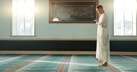 Image showing Gratitude, islamic and man with faith in a mosque for praying, peace and spiritual care in holy religion for Allah. Respect, Ramadan and Muslim person with kindness, hope and humble after worship