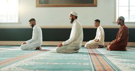 Image showing Islamic, praying and holy men in a Mosque for spiritual religion together as a group to worship Allah in Ramadan. Muslim, Arabic and people with peace or respect for gratitude, trust and hope