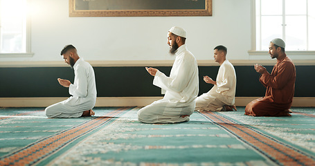 Image showing Islamic, praying and holy men in a Mosque for spiritual religion together as a group to worship Allah in Ramadan. Muslim, Arabic and people with peace or respect for gratitude, trust and hope