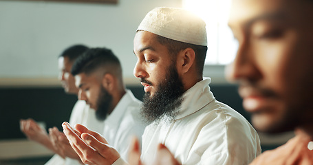 Image showing Muslim, praying and group in a Mosque for spiritual religion together as men to worship Allah in Ramadan. Islamic, Arabic and holy people with peace or respect for gratitude, trust and hope for eid