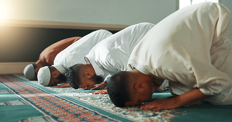 Image showing Muslim, praying and men in a Mosque for spiritual religion together as a group to worship Allah in Ramadan. Islamic, Arabic and holy people with peace or respect for gratitude, trust and hope