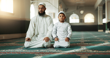 Image showing Muslim, praying and father with child in Mosque for spiritual religion together or teaching to worship Allah. Islamic, Arabic and parent with kid for peace or respect as gratitude, trust and hope