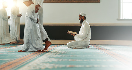 Image showing Quran, islamic and man reading for faith in a mosque for praying, peace and spiritual care in holy religion for Allah. Respect, Ramadan and Muslim person with kindness, hope and humble after worship