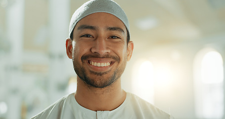 Image showing Face, smile and Muslim man in mosque on lens flare with prayer cap to worship God, Allah and praise. Portrait, happy and Islamic person in temple in hat for faith, culture and funny laugh in UAE.