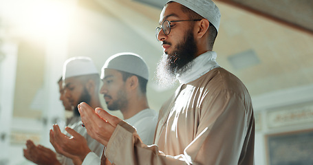 Image showing Islam, praise and group of men in mosque praying with mindfulness, gratitude and celebration of faith. Worship, religion and Muslim people together in holy temple for spiritual teaching and peace.