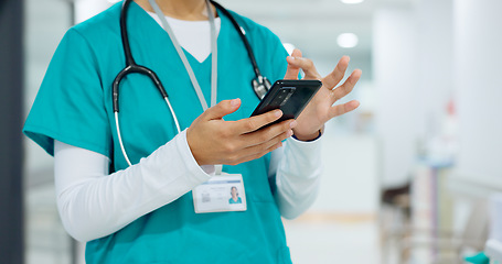 Image showing Hands, phone and communication with a nurse scrolling in a hospital closeup for research or networking. Medical, mobile and information with a medicine professional reading a text message in a clinic