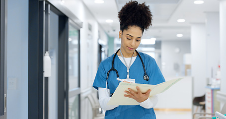 Image showing Nurse, writing and document in hospital for insurance, healthcare and compliance report with patient information. Paperwork, checklist and doctor with medical notes in file, chart or folder in clinic