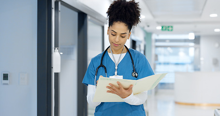 Image showing Nurse, writing and document in hospital for insurance, healthcare and compliance report with patient information. Paperwork, checklist and doctor with medical notes in file, chart or folder in clinic