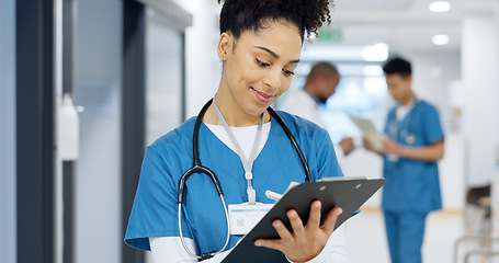Image showing Woman doctor, documents and writing in medical checklist, medical charts and hospital notes or clinic service. Healthcare worker or happy nurse with clipboard, paperwork and schedule update or report