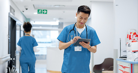 Image showing Walking, tablet or doctor in hospital with research on social media to search for medicine info online. Asian man reading, smile or medical healthcare nurse browsing on technology for telehealth news