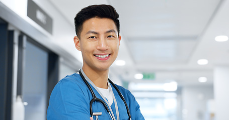 Image showing Healthcare, face and asian man or doctor with smile for wellness, trust and service in hospital or clinic. Portrait, person and expert with happiness for career, cardiology or nursing at workplace