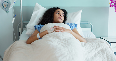 Image showing Hospital bed, woman and stress from medical, surgery and ICU patient in a clinic from help. Anxiety, thinking and tired female person with healthcare, sick and recovery with mental health and care