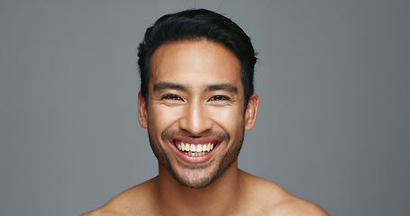 Image showing Man, face and natural beauty with hygiene and cosmetics, headshot and skincare isolated on grey background. Mockup space, portrait and clean dermatology, smile with grooming and self care in studio