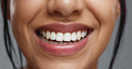 Image showing Woman, mouth and closeup in studio for dental wellness, beauty and change with cosmetics by background. Girl, teeth whitening and smile for cleaning, health and zoom for oral care with hygiene