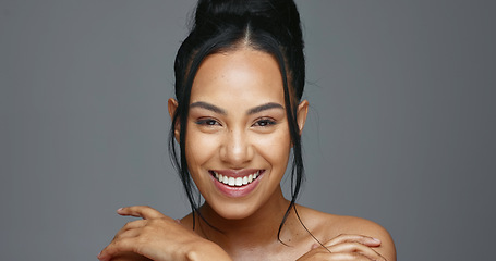 Image showing Face, skincare and beauty of woman in studio isolated on a gray background mockup space. Portrait, natural and serious model in spa facial treatment for aesthetic, cosmetic and wellness for health